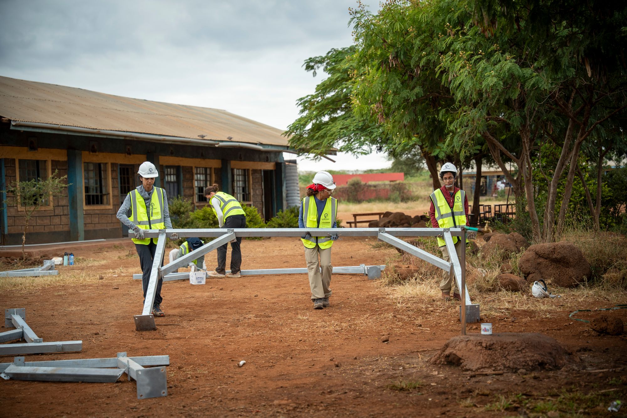 UT Austin students assembling a solar array at a rural Kenyan school